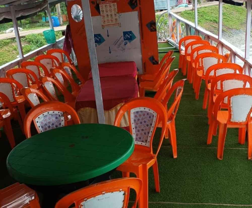 boat inside lunch chair and tables